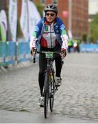 13 September 2015; The Irish Sports Council, in conjunction with Cycling Ireland teamed up with the Department of Transport, Tourism and Sport, Dublin City Council and Healthy Ireland for the Great Dublin Bike Ride which seen over 3,000 participants of all abilities from novice to expert ride 60km or 100km routes. Pictured is John Treacy, CEO Irish Sports Council, as he cycles across the finish line. The Great Dublin Bike Ride. Smithfield Square, Dublin. Picture credit: Seb Daly / SPORTSFILE