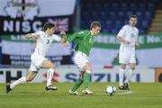 1 April 2009; Steve Davis, Northern Ireland, in action against Andrej Komac, Slovenia. 2010 FIFA World Cup Qualifier, Northern Ireland v Slovenia, Windsor Park, Belfast, Co. Antrim. Picture credit: Oliver McVeigh / SPORTSFILE