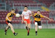 1 April 2009; Emmett McKenna, Tyrone, in action against Conor Maginn, left, and Eamon Toner, Down. Cadbury Ulster U21 Football Championship Semi-Final, Down v Tyrone, Pairc Esler, Newry, Co. Down. Picture credit: Brian Lawless / SPORTSFILE