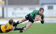 3 April 2009; Gavin Duffy, Connacht, is tackled by Jason Tovey, Newport Gwent Dragons. Magners League, Connacht v Newport Gwent Dragons, Sportsground, Galway. Picture credit: Matt Browne / SPORTSFILE