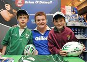 2 April 2009; Hot on the heels of Ireland’s fantastic grand slam win, player of the tournament and Gillette Ambassador Brian O’Driscoll took part in a series of Superquinn in-store signings much to the delight of the large crowd that packed the Lucan and Swords stores. The in-store signings are part of a Gillette / Superquinn promotion which is offering 33% off Gillette’s new shavecare range, recently launched by O’Driscoll. The Irish captain spent time with a host of delighted fans and will now turn his attention to this weekend’s big Magner’s League clash against rivals Munster. Pictured with Brian are Oisin Byrne, left, age 8 and Cian Maxwel, age 9, from Maynooth, Co. Kildare. Superquinn, Lucan and Pavillions, Swords. Picture credit: Brendan Moran / SPORTSFILE