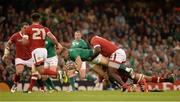 19 September 2015; Ian Madigan, Ireland, is tackled by Djustice Sears-Duru, Canada. 2015 Rugby World Cup, Pool D, Ireland v Canada. Millennium Stadium, Cardiff, Wales. Picture credit: Brendan Moran / SPORTSFILE