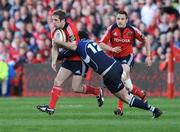 4 April 2009; Tomas O'Leary, Munster, is tackled by Shane Horgan, Leinster. Magners League, Munster v Leinster, Thomond Park, Limerick. Picture credit: Matt Browne / SPORTSFILE