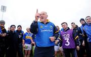 29 March 2009; Tipperary manager John Evans talks to his players after the game. Allianz GAA NFL Division 3, Round 6, Tipperary v Louth, Semple Stadium, Thurles, Co. Tipperary. Picture credit: Matt Browne / SPORTSFILE