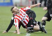 10 April 2009; Liam Kearney, Derry City, in action against Gavin Peers, Sligo Rovers. League of Ireland Premier Division, Derry City v Sligo Rovers, Brandywell, Derry.  Picture credit: Oliver McVeigh / SPORTSFILE