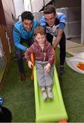 21 September 2015; Dublin's Bernard Brogan and Brian Fenton with Donnacha Mannion, age 3, from Mayo, during a visit from the GAA Football All-Ireland Champions Dublin to Our Lady's Children's Hospital, Crumlin, Dublin. Picture credit: David Maher / SPORTSFILE
