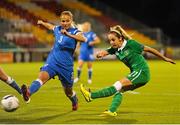 21 September 2015; Julie Russell, Republic of Ireland, takes a shot after evading the attention of Tuija Hyyrynen, Finland. UEFA Women's EURO 2017 Qualifier Group 2, Republic of Ireland v Finland. Tallaght Stadium, Tallaght, Co. Dublin. Picture credit: Seb Daly / SPORTSFILE