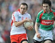 12 April 2009; Niall Gormley, Tyrone, in action against Kevin McLoughlin, Mayo. Allianz GAA National Football League, Division 1, Round 7, Mayo v Tyrone, McHale Park, Castlebar, Co. Mayo. Picture credit: David Maher / SPORTSFILE *** Local Caption ***