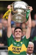 20 September 2015; Graham O'Sullivan, Kerry, lifts the Tom Markham Cup. Electric Ireland GAA Football All-Ireland Minor Championship Final, Kerry v Tipperary, Croke Park, Dublin. Picture credit: Stephen McCarthy / SPORTSFILE
