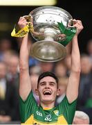 20 September 2015; Graham O'Sullivan, Kerry, lifts the Tom Markham Cup. Electric Ireland GAA Football All-Ireland Minor Championship Final, Kerry v Tipperary, Croke Park, Dublin. Picture credit: Stephen McCarthy / SPORTSFILE