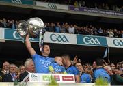 20 September 2015; Denis Bastick, Dublin, lifts the Sam Maguire after the game. GAA Football All-Ireland Senior Championship Final, Dublin v Kerry, Croke Park, Dublin. Picture credit: Ray McManus / SPORTSFILE