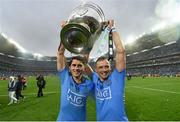 20 September 2015; Dublin brothers Bernard, left, and Alan Borgan celebrates with the Sam Maguire following their side's victory. GAA Football All-Ireland Senior Championship Final, Dublin v Kerry, Croke Park, Dublin. Picture credit: Stephen McCarthy / SPORTSFILE