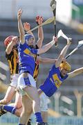 3 May 2009; John O'Brien, left, and Shane McGrath, Tipperary, in action against Tommy Walsh, left, and Michael Rice, Kilkenny. Allianz GAA NHL Division 1 Final, Kilkenny v Tipperary, Semple Stadium, Thurles, Co. Tipperary. Picture credit: Diarmuid Greene / SPORTSFILE