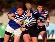 16 December 2000; Shane Byrne of Blackrock College is tackled by David Griffin of St Mary's College during the AIB All-Ireland League Division 1 match between Blackrock College and St Mary's College at Templeville Road in Dublin. Photo by Matt Browne/Sportsfile