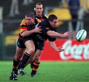 16 December 2000; Eamonn Buckley of Young Munster RFC is tackled by Colin McEntee of Lansdowne RFC during the AIB All-Ireland League Division 1 match between Lansdowne RFC and Young Munster RFC at Lansdowne Road in Dublin. Photo by Brendan Moran/Sportsfile