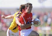 9 June 2013; John O'Brien of Louth in action against Brian Malone of Wexford during the Leinster GAA Football Senior Championship Quarter-Final match between Louth and Wexford at the County Grounds in Drogheda, Louth. Photo by Dáire Brennan/Sportsfile