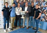 1 October 2015; Dublin players, from left, Cormac Costello, Bernard Brogan, James McCarthy, and Davy Byrne accompanied by Aidan Connaughton, AIG Consumer Lines Manager, EMEA, and Declan O’Rourke, General Manager, AIG Ireland, right, were at AIG Insurance’s offices in Dublin today for a reception to mark their GAA Football All-Ireland Championship success. AIG, North Wall Quay, Dublin. Picture credit: Stephen McCarthy / SPORTSFILE