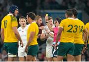 3 October 2015; Referee Romain Poite shows a yellow card to Owen Farell, centre right, England, despite the protest of England captain Chris Robshaw. 2015 Rugby World Cup, Pool A, England v Australia, Twickenham Stadium, London, England. Picture credit: Brendan Moran / SPORTSFILE