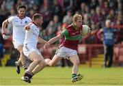 4 October 2015; Sean Leo McGoldrick, Coleraine, in action against Barry McGuigan, Slaughtneil. Derry County Senior Football Championship Final, Coleraine v Slaughtneil, Celtic Park, Derry. Picture credit: Oliver McVeigh / SPORTSFILE