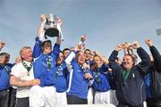 10 May 2009; Crumlin United FC captain Derek Griffin lifts the FAI Umbro Intermediate Cup as he celebrates with team-mates and officials. FAI Umbro Intermediate Cup Final, Crumlin United FC v Bluebell United FC, Tallaght Stadium, Dublin. Picture credit: David Maher / SPORTSFILE