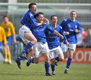 10 May 2009; Derek Griffin, second from left, Crumlin United FC, celebrates after scoring his side's third and winning goal with team-mates Ciaran Kenna, left and Paul McCabe. FAI Umbro Intermediate Cup Final, Crumlin United FC v Bluebell United FC, Tallaght Stadium, Dublin. Picture credit: David Maher / SPORTSFILE
