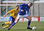 10 May 2009; Stephen Larkin, Crumlin United FC, in action against Stuart Smith, Bluebell United FC. FAI Umbro Intermediate Cup Final, Crumlin United FC v Bluebell United FC, Tallaght Stadium, Dublin. Picture credit: David Maher / SPORTSFILE