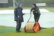 14 May 2009; Ireland captain Kyle McCallan and grounds man Alan Delany in conversation after rain delayed play against Leicestershire. Friends Provident Trophy, Ireland v Leicestershire, Castle Avenue, Clontarf, Dublin. Picture credit: Pat Murphy / SPORTSFILE