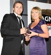 14 May 2009; Ulster's  Darren Cave receives the Vodafone Young Player of the Year Award from Pauline Quigley Head of Vodafone Northern Ireland, during the Ulster Rugby Awards 08:09 at the Ramada Hotel Belfast, Co. Antrim. Picture credit: John Dickson / SPORTSFILE