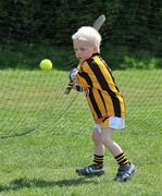 10 May 2009; Four-year-old Kevin Hogan from the Faughs GAA club in Templeogue, Co. Dublin participates in Lá na gClub activities as GAA clubs around the country celebrate the Anniversary with games and commemorative events in their local communities. Clubs have been encouraged to celebrate the GAA’s century and a quarter anniversary by organising events within their communities which underline their importance and special contribution to their respective areas. Picture credit: David Maher / SPORTSFILE  *** Local Caption ***