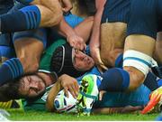 4 October 2015; Edoardo Gori, Italy, is tackled by Iain Henderson, Ireland. 2015 Rugby World Cup, Pool D, Ireland v Italy. Olympic Stadium, Stratford, London, England. Picture credit: Stephen McCarthy / SPORTSFILE