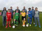 5 October 2015; Pictured are Republic of Ireland players Aine O’Gorman and Julianne Russell, Eunan O'Kane, Jonathan Walters and Robbie Brady with children from left, Aoife Farrell, age 10, Tadhg Curran, age 11, Lee Reid, age 11, and Temilade Fetuga, age 11, from St. Bernadette's Junior School, Clondalkin, Co. Dublin, with Colin Donnelly, Sales Director Spar Ireland. The Republic of Ireland players made a surprise appearance at an exclusive SPAR training session at the National Sports Campus in advance of the Republic of Ireland vs Germany game on Thursday. SPAR is the Official Convenience Retail Partner of the FAI. FAI National Training Centre, National Sports Campus, Abbotstown, Dublin. Picture credit: David Maher / SPORTSFILE