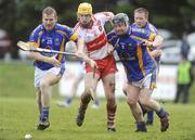 16 May 2009; Sean McCullagh, Derry, in action against Jonathan O'Neill and Geoffrey Bermingham, Wicklow. Christy Ring Cup, Round 2B, Derry v Wicklow, Swatragh, Co. Derry. Picture credit: Oliver McVeigh / SPORTSFILE