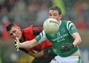 17 May 2009; Michael McAleer, Fermanagh, in action against David McKibben, Down. Ulster Minor Football Championship, Fermanagh v Down, Brewster Park, Enniskillen, Co. Fermanagh. Picture credit: David Maher / SPORTSFILE