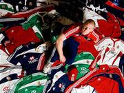 18 May 2009; The 2009 British & Irish Lions squad gathered for the first time today as preparations for the 10-match tour of South Africa continued with the start of a week-long training camp. Pictured surrounded by some of the 7500 pieces of adidas kit that the British & Irish Lions will take to South Africa is captain Paul O'Connell. Pennyhill Park Hotel, Bagshot, UK. Picture credit: Andrew Fosker / SPORTSFILE