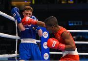 10 October 2015; Joahnys Argilagos, right, Cuba, exchanges punches with Brendan Irvine, Ireland, during their Men's Light Flyweight 46-49kg Quarter-Final bout. AIBA World Boxing Championships, Quarter-Finals, Ali Bin Hamad Al Attiyah Arena, Doha, Qatar. Photo by Sportsfile