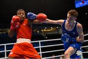 10 October 2015; Brendan Irvine, right, Ireland, exchanges punches with Joahnys Argilagos, Cuba, during their Men's Light Flyweight 46-49kg Quarter-Final bout. AIBA World Boxing Championships, Quarter-Finals, Ali Bin Hamad Al Attiyah Arena, Doha, Qatar. Photo by Sportsfile