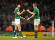11 October 2015; Ireland's Tommy Bowe, left, and Robbie Henshaw following their victory. 2015 Rugby World Cup Pool D, Ireland v France. Millennium Stadium, Cardiff, Wales. Picture credit: Stephen McCarthy / SPORTSFILE