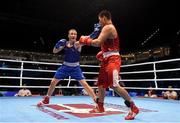 11 October 2015; Michael O'Reilly, left, Ireland, exchanges punches with Bektemir Melikuziev, Uzbekistan, during their Men's Middleweight 75kg Quarter-Final bout. AIBA World Boxing Championships, Semi-Finals, Ali Bin Hamad Al Attiyah Arena, Doha, Qatar. Photo by Sportsfile