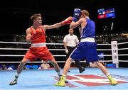 11 October 2015; Michael Conlan, left, Ireland, exchanges punches with Dzmitry Asanau, Belarus, during their Men's Bantamweight 56kg Semi-Final bout. AIBA World Boxing Championships, Semi-Finals, Ali Bin Hamad Al Attiyah Arena, Doha, Qatar. Photo by Sportsfile