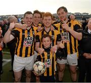 11 October 2015; Stephen Finnegan, James Morgan, Kyle Carragher, Johnny Hanratty, and Caol Hanratty, Crossmaglen Rangers supporter, after the game. Armagh County Senior Football Championship Final, Crossmaglen Rangers v Armagh Harps. Athletic Grounds, Armagh. Picture credit: Oliver McVeigh / SPORTSFILE