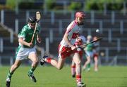 30 May 2009; Kevin Hinphey, Derry, in action against Stephen Fox, London. Ulster GAA Hurling Senior Championship Quarter-Final, Derry v London, Casement Park, Belfast. Picture credit: Oliver McVeigh / SPORTSFILE