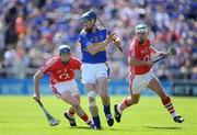 31 May 2009; John O'Brien, Tipperary, in action against Pat Horgan, left, and Niall McCarthy, Cork. Munster GAA Hurling Senior Championship Quarter-Final, Tipperary v Cork, Semple Stadium, Thurles, Co. Tipperary. Picture credit: Brendan Moran / SPORTSFILE