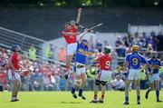 31 May 2009; Sean Og O hAilpin, Cork, contests a dropping ball with John O'Brien, Tipperary. Munster GAA Hurling Senior Championship Quarter-Final, Tipperary v Cork, Semple Stadium, Thurles, Co. Tipperary. Picture credit: Brendan Moran / SPORTSFILE