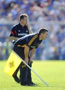 31 May 2009; Tipperary manager Liam Sheedy and Cork manager Denis Walsh watch the final moments of the game. Munster GAA Hurling Senior Championship Quarter-Final, Tipperary v Cork, Semple Stadium, Thurles, Co. Tipperary. Picture credit: Brendan Moran / SPORTSFILE