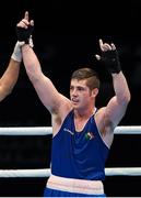 11 October 2015; Joseph Ward, Ireland, celebrates after beating Elshod Rasulov, Uzbekistan, in their Men's Light Heavyweight 81kg Semi-Final Bout. AIBA World Boxing Championships, Semi-Finals. Ali Bin Hamad Al Attiyah Arena, Doha, Qatar. Photo by Sportsfile