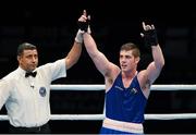 11 October 2015; Joseph Ward, Ireland, celebrates after beating Elshod Rasulov, Uzbekistan, in their Men's Light Heavyweight 81kg Semi-Final Bout. AIBA World Boxing Championships, Semi-Finals. Ali Bin Hamad Al Attiyah Arena, Doha, Qatar. Photo by Sportsfile