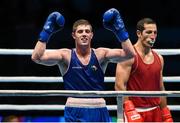 11 October 2015; Joseph Ward, Ireland, celebrates after beating Elshod Rasulov, Uzbekistan, in their Men's Light Heavyweight 81kg Semi-Final Bout. AIBA World Boxing Championships, Semi-Finals. Ali Bin Hamad Al Attiyah Arena, Doha, Qatar. Photo by Sportsfile