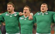 11 October 2015; Ireland players, from left, Sean O'Brien, Eoin Reddan and Jack McGrath the national anthem ahead of the game. 2015 Rugby World Cup Pool D, Ireland v France. Millennium Stadium, Cardiff, Wales. Picture credit: Brendan Moran / SPORTSFILE