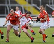 6 June 2009; Claire Scullion, Tyrone, in action against Clodagh McCann and Grainne McAlinden, Armagh. TG4 GAA Football Ulster Senior Ladies Championship Semi-Final, Breffni Park, Cavan. Picture credit: Oliver McVeigh / SPORTSFILE