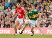 7 June 2009; Marc O Se, Kerry, in action against Alan O'Connor, Cork. Munster GAA Football Senior Championship Semi-Final, Kerry v Cork, Fitzgerald Stadium, Killarney, Co. Kerry. Picture credit: Stephen McCarthy / SPORTSFILE